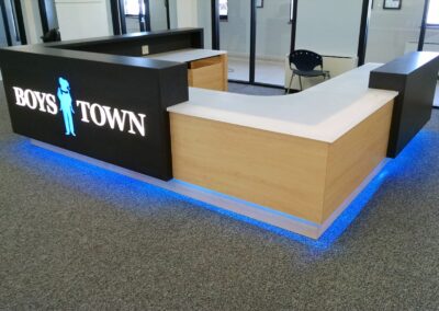 Custom Front Desk and Paneling