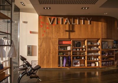 Custom paneling, signage, shelving, and built-in storage in a commercial storefront